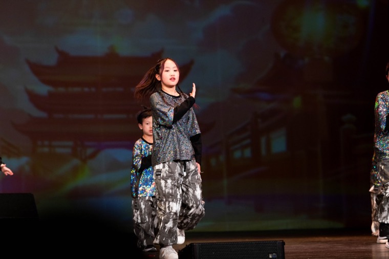 A solo performer sings on the New Year stage
